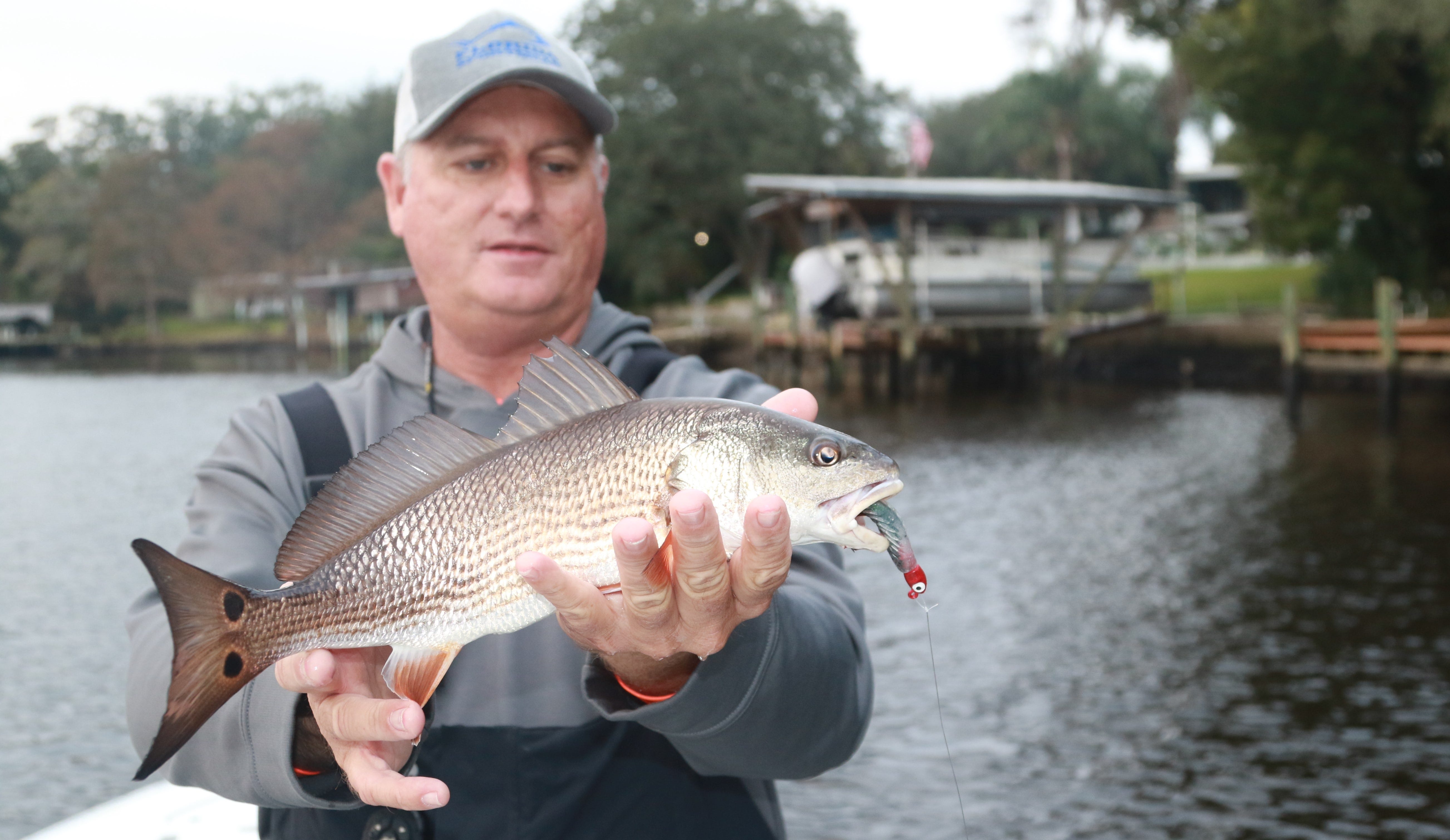 Capt. Chris Holleman with redfish