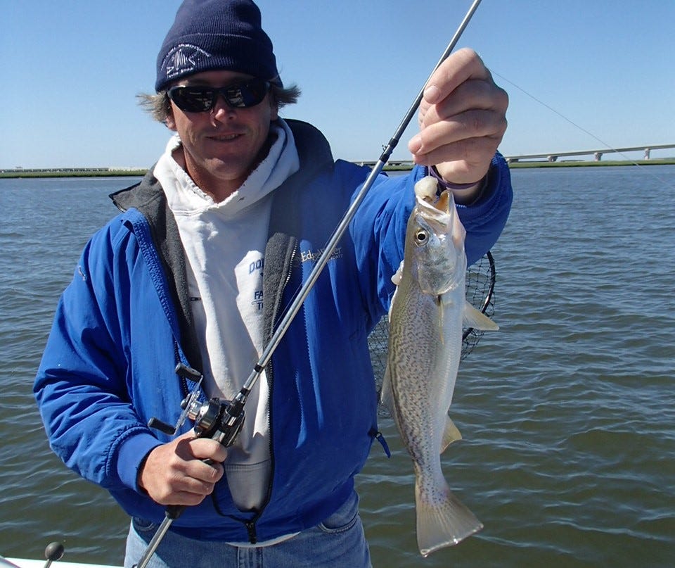 angler with weakfish