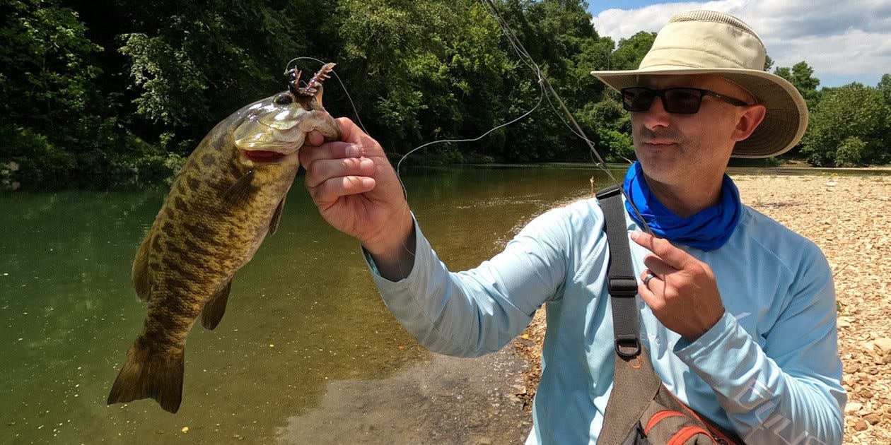 creek smallmouth bass on Hellgrammite lure