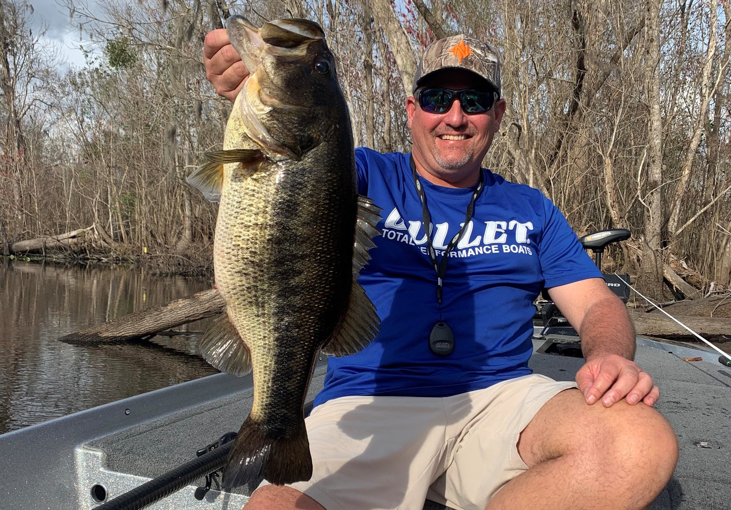 Tim Mann with a big sight fishing bass